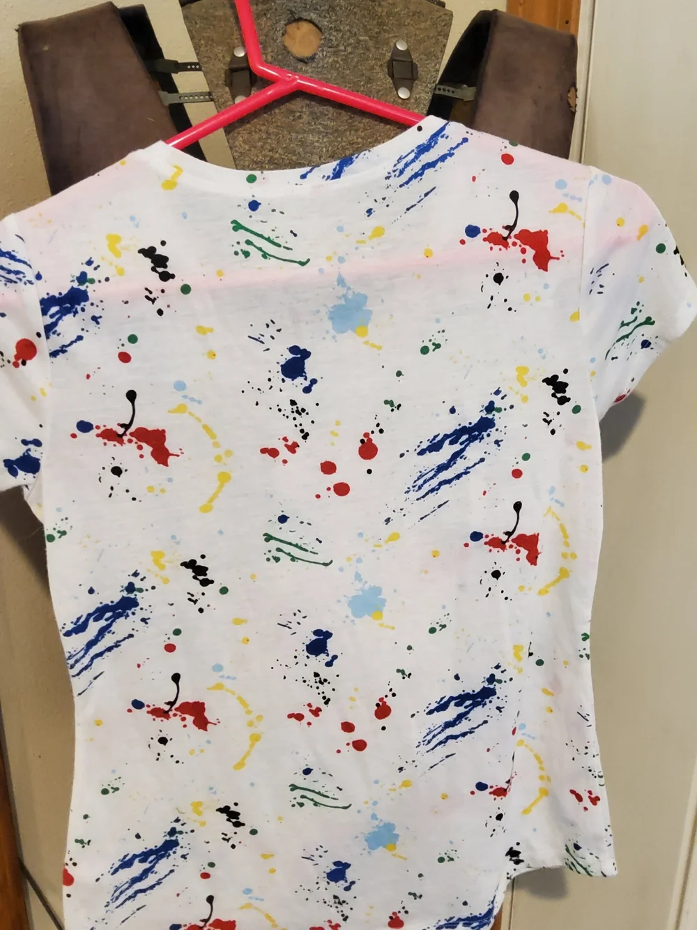 Justice White Graphic Tee with Multicolor Paint Splatter